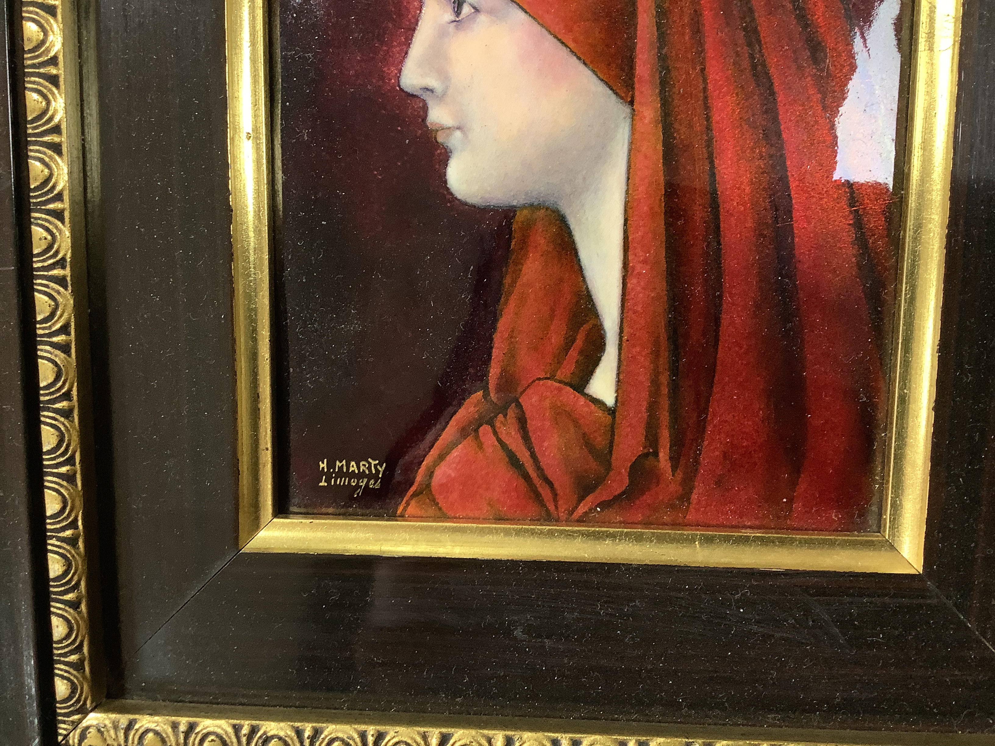 Henriette Marty (1902-1996), a Limoges enamelled plaque on copper of Fabiola, signed, framed, overall 30 x 26cm